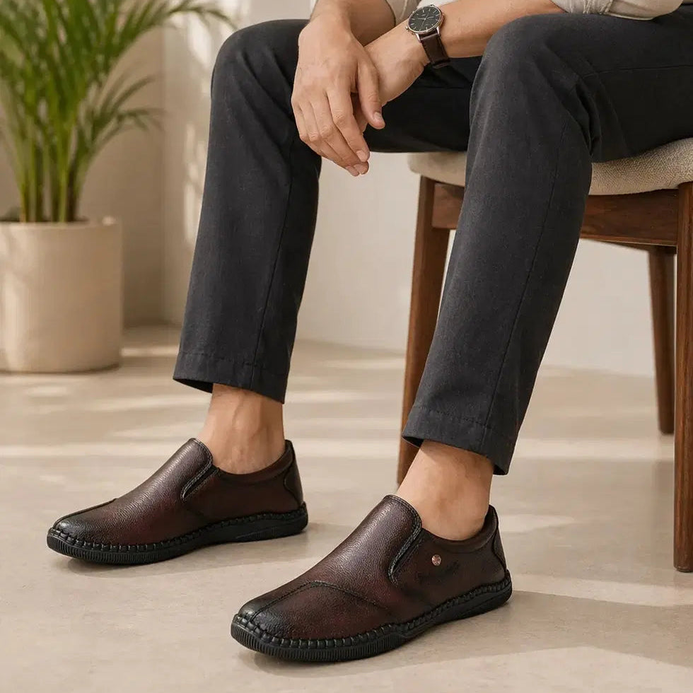 Men's brown synthetic leather slip-on shoes with round toe - model view