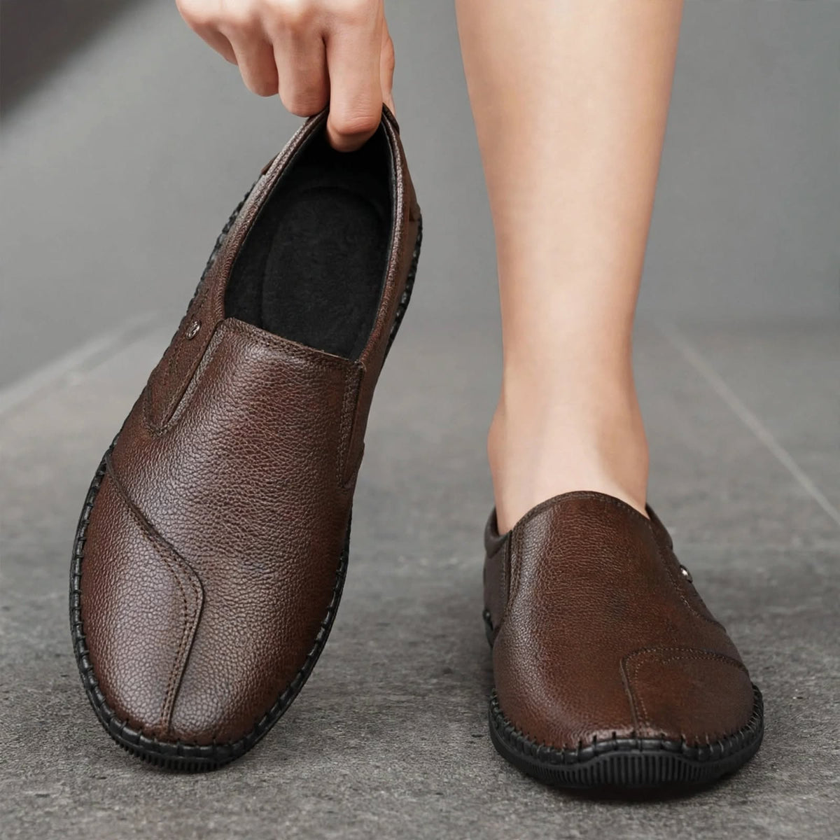Men's brown synthetic leather slip-on shoes with round toe - front view