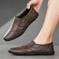 Men's brown synthetic leather slip-on shoes with round toe - side and angle view